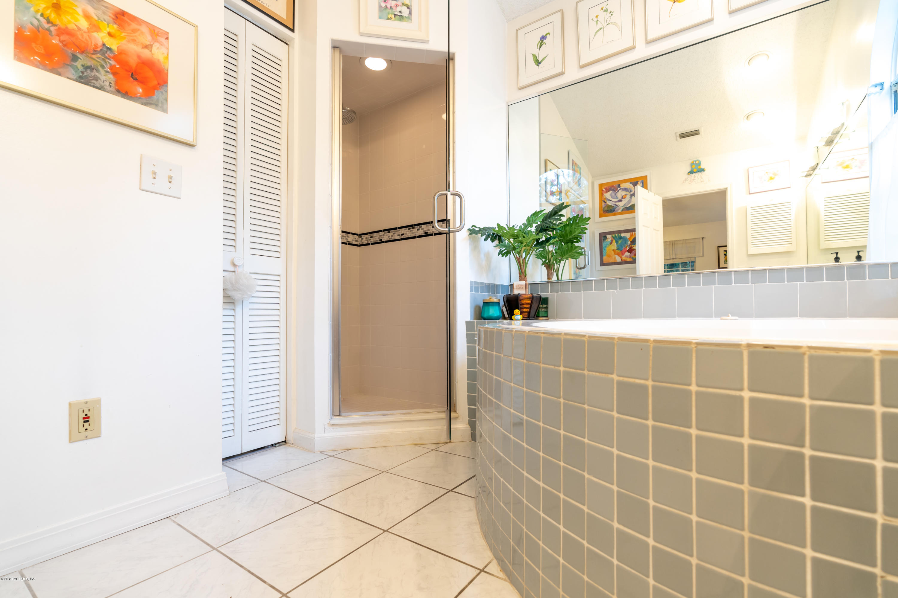 9 Beach Street St. Augustine, FL 32080 - Photo 23 of 28 a bathroom with a shower