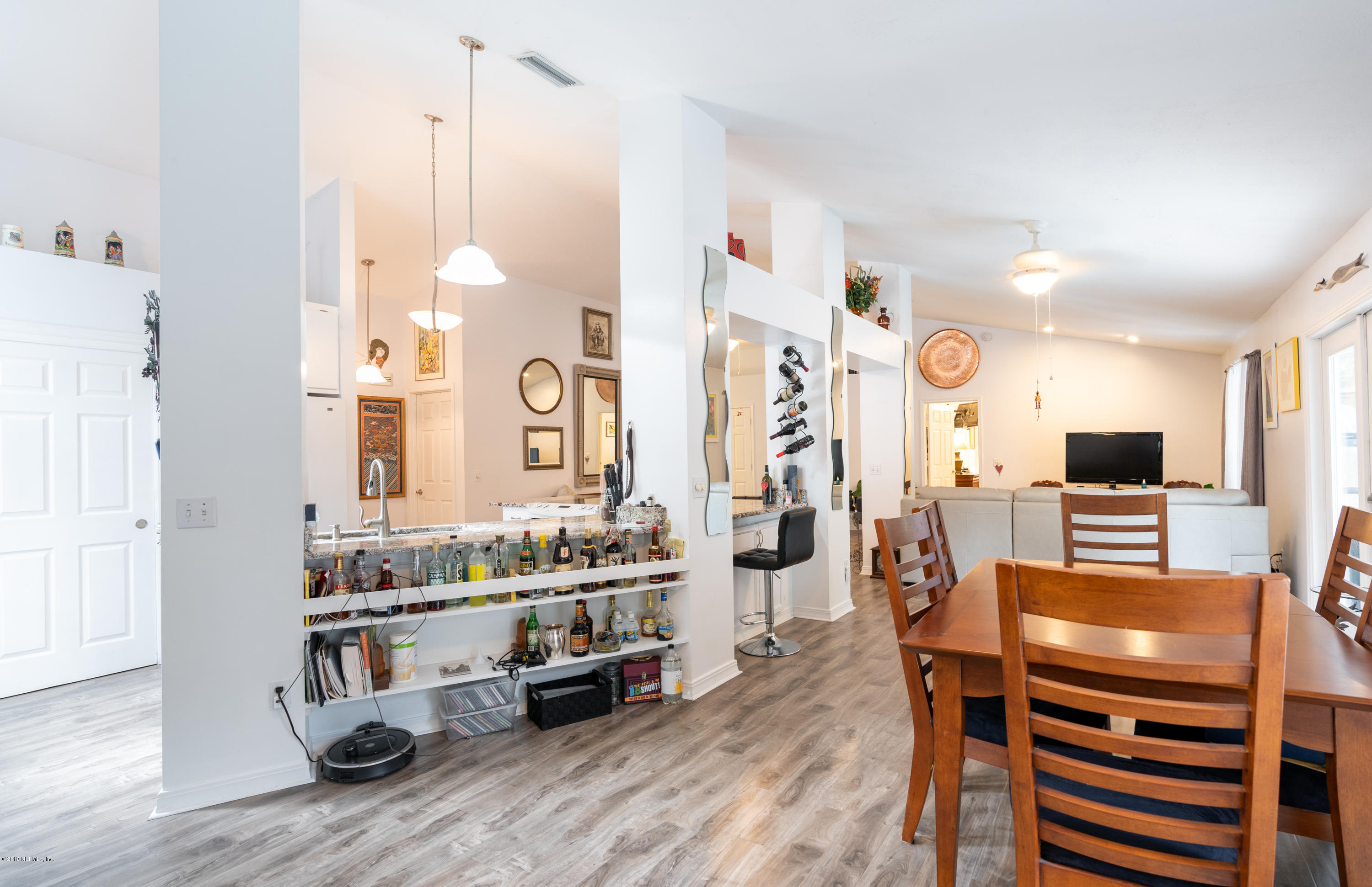 9 Beach Street St. Augustine, FL 32080 - Photo 8 of 28 a living room with furniture and a flat screen tv