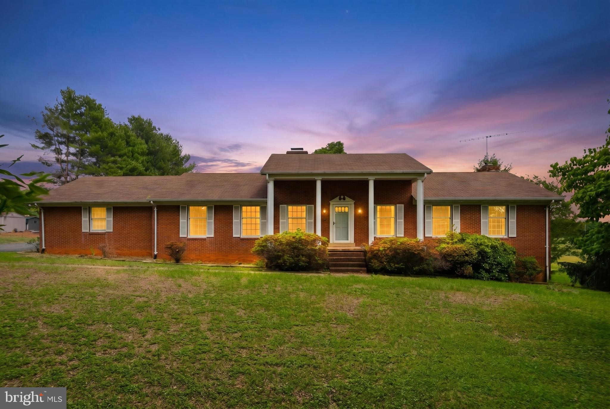 11081 Marquis Road Unionville, VA 22567 - Photo 1 of 49 a front view of a house with garden