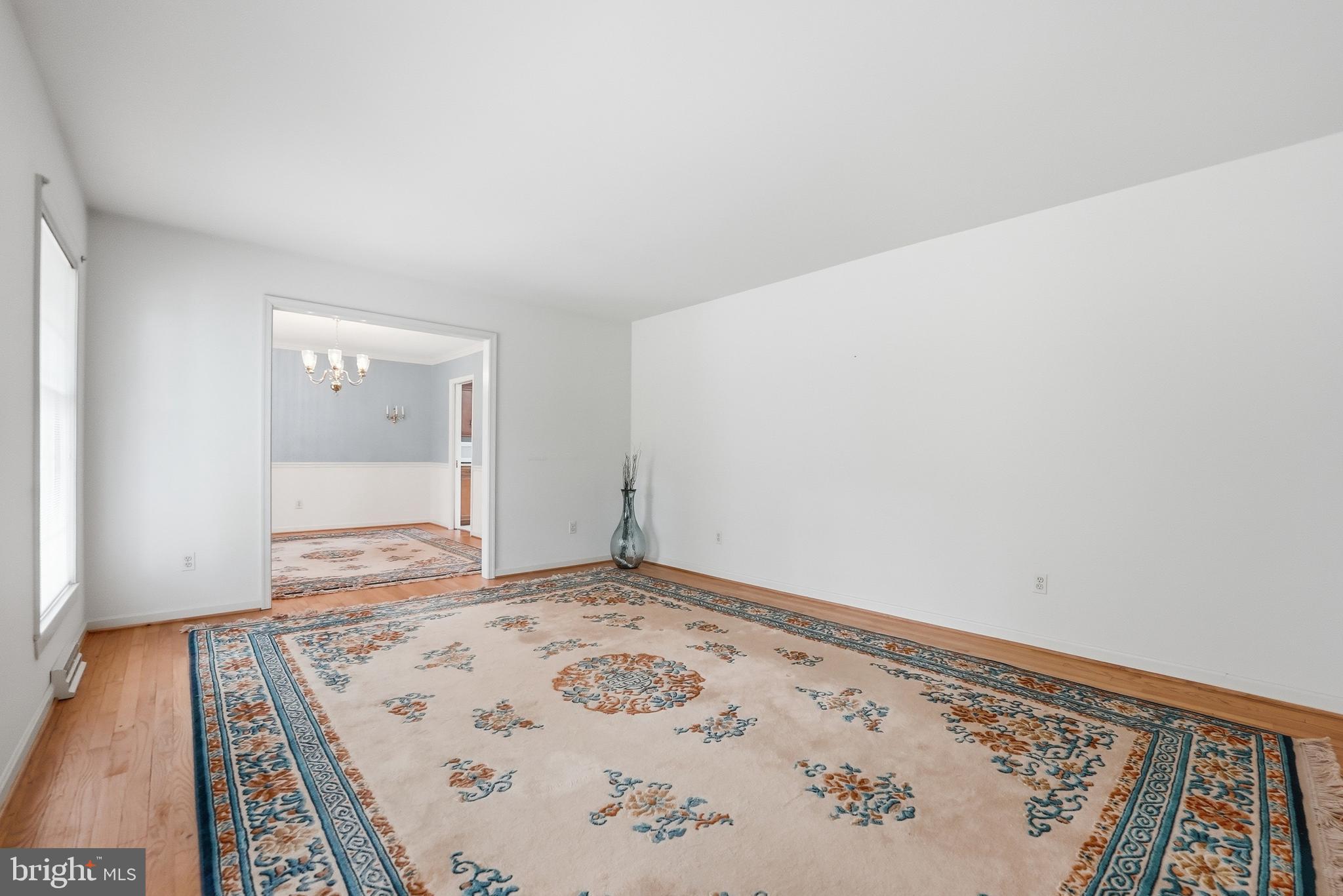 11081 Marquis Road Unionville, VA 22567 - Photo 15 of 49 a view of a bedroom with wooden floor and bathroom