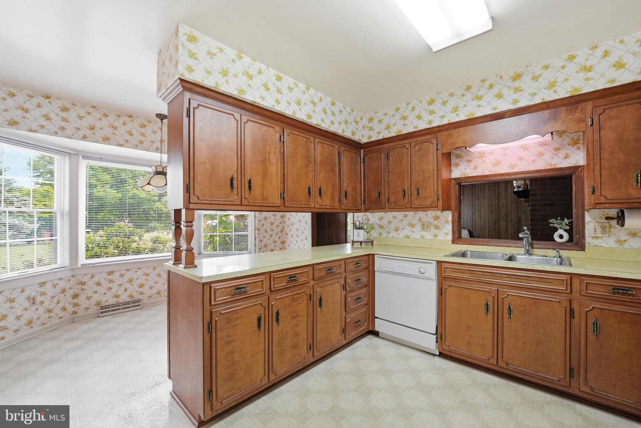 11081 Marquis Road Unionville, VA 22567 - Photo 20 of 49 a kitchen with a sink window and cabinets