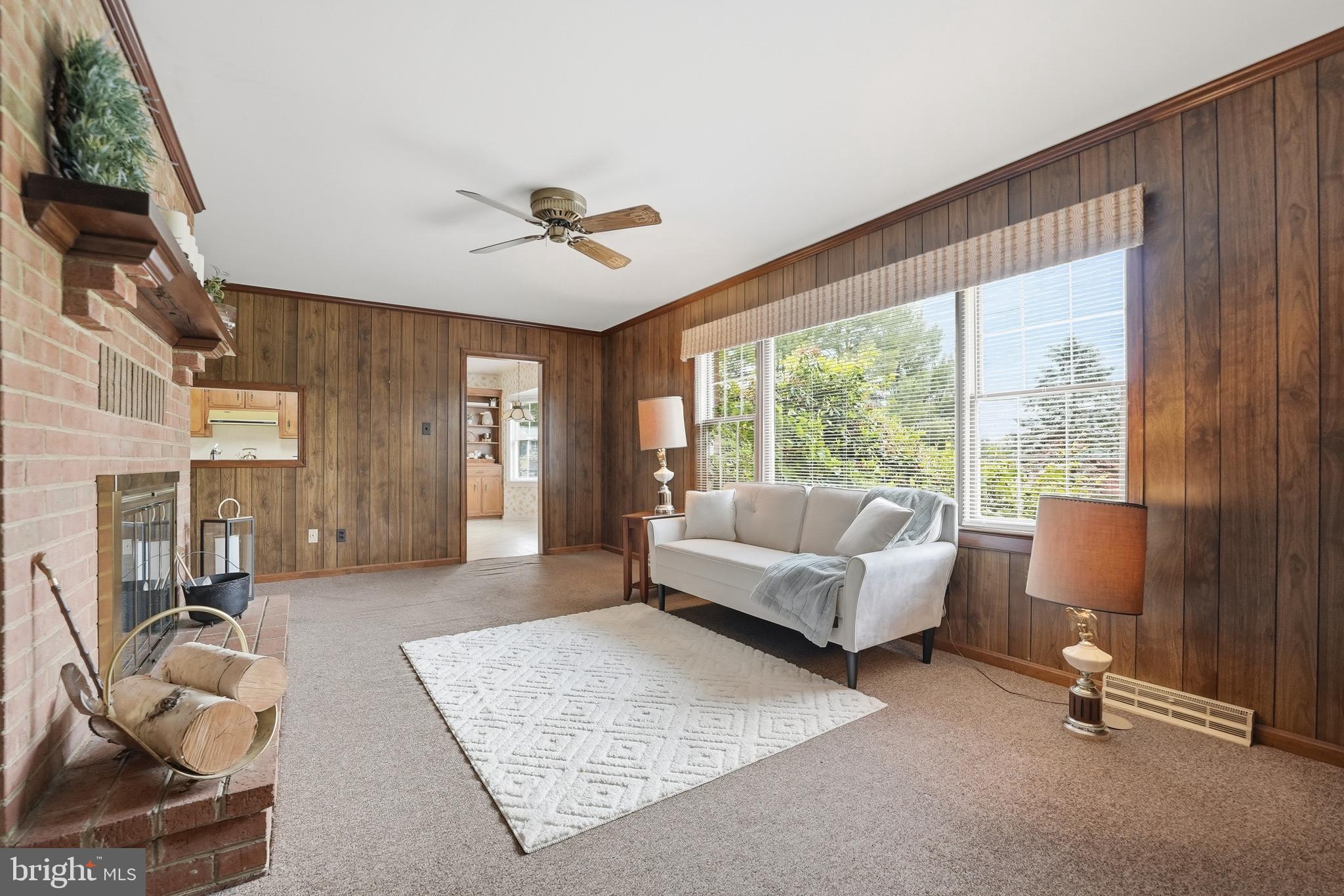 11081 Marquis Road Unionville, VA 22567 - Photo 28 of 49 a living room with furniture and a large window