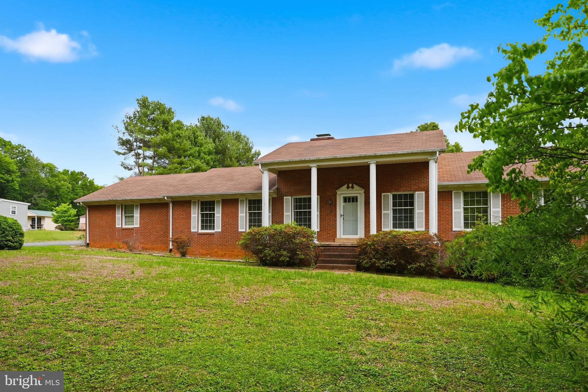 11081 Marquis Road Unionville, VA 22567 - Photo 3 of 49 a front view of a house with garden