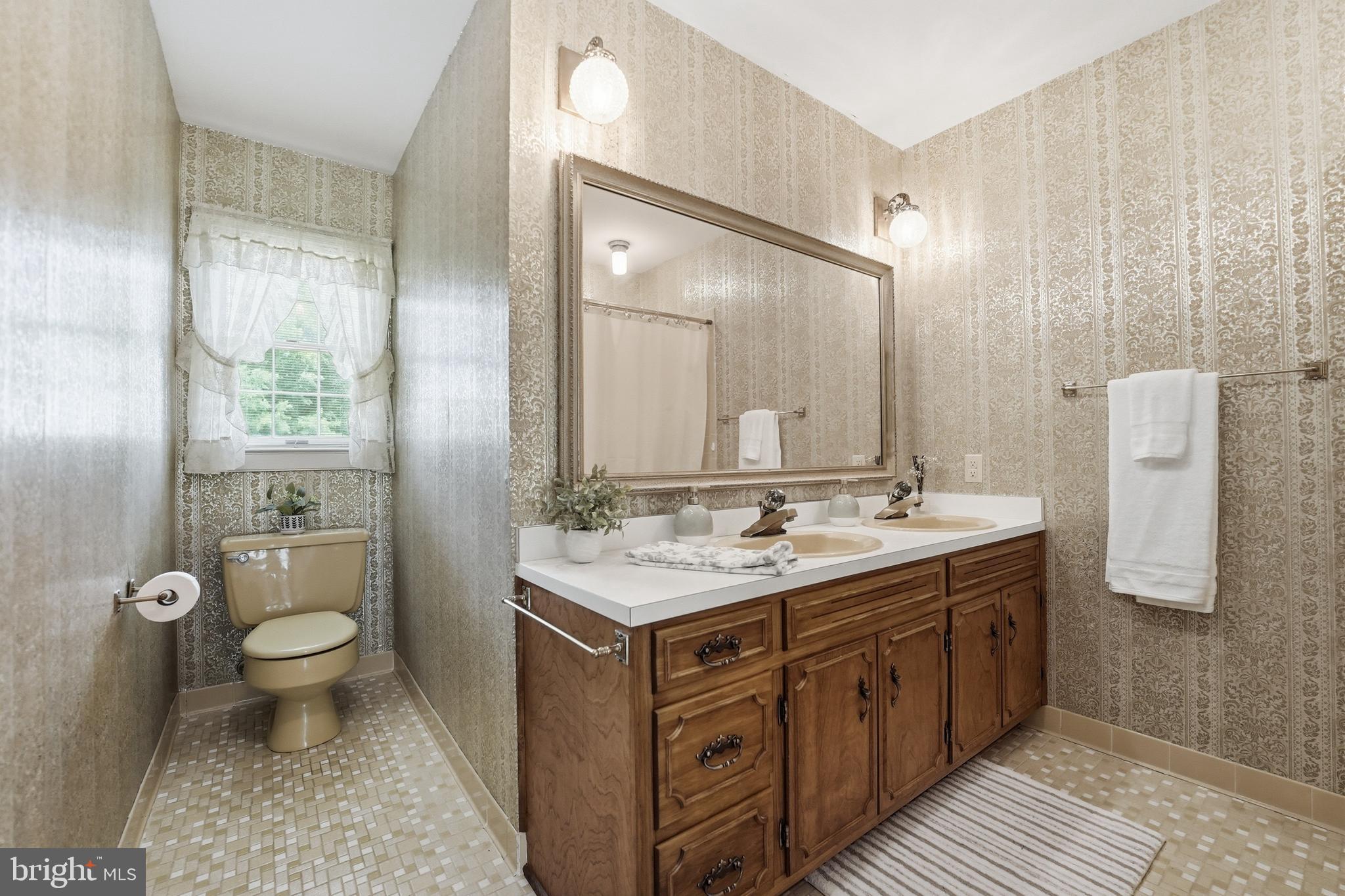 11081 Marquis Road Unionville, VA 22567 - Photo 31 of 49 a bathroom with a granite countertop sink toilet and shower