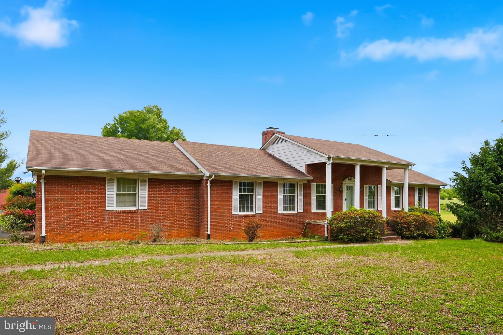 11081 Marquis Road Unionville, VA 22567 - Photo 4 of 49 a front view of a house with garden