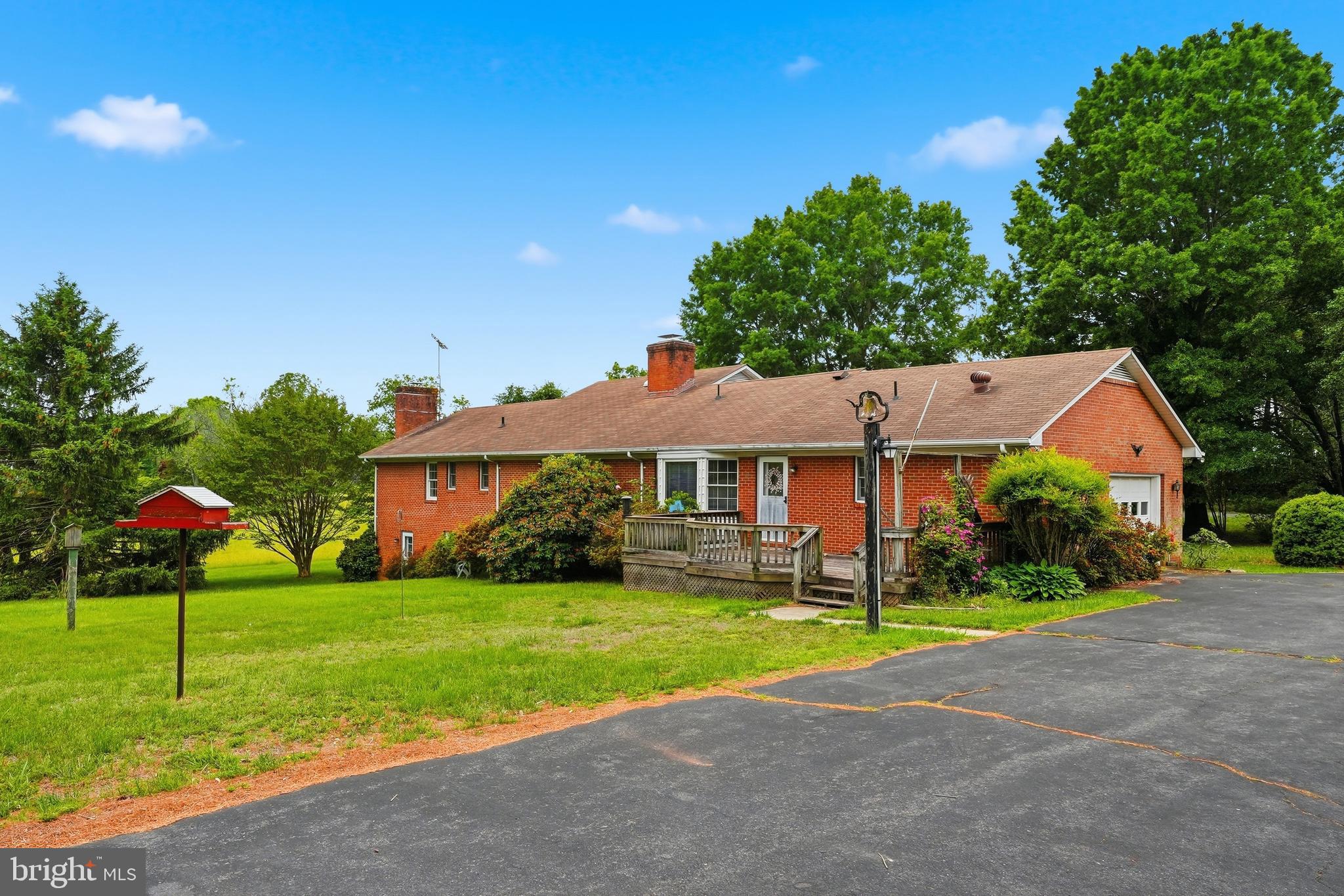 11081 Marquis Road Unionville, VA 22567 - Photo 47 of 49 a view of a house next to a yard