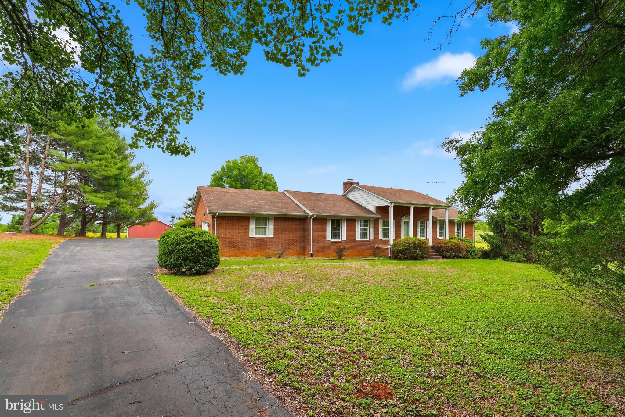 11081 Marquis Road Unionville, VA 22567 - Photo 5 of 49 a front view of a house with garden