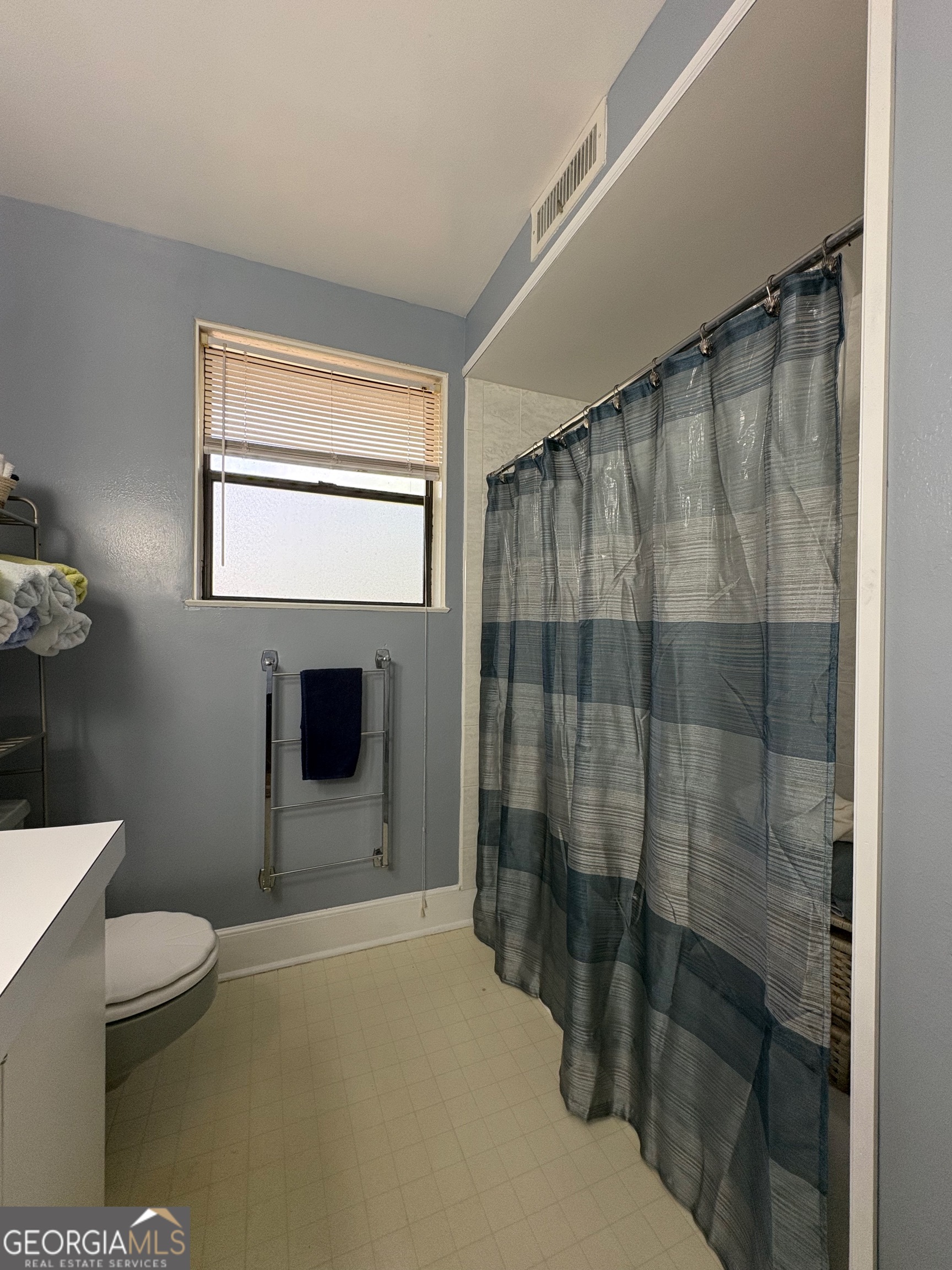 700 Forrest Drive Fort Valley, GA 31030 - Photo 27 of 41 a bathroom with a shower and a toilet