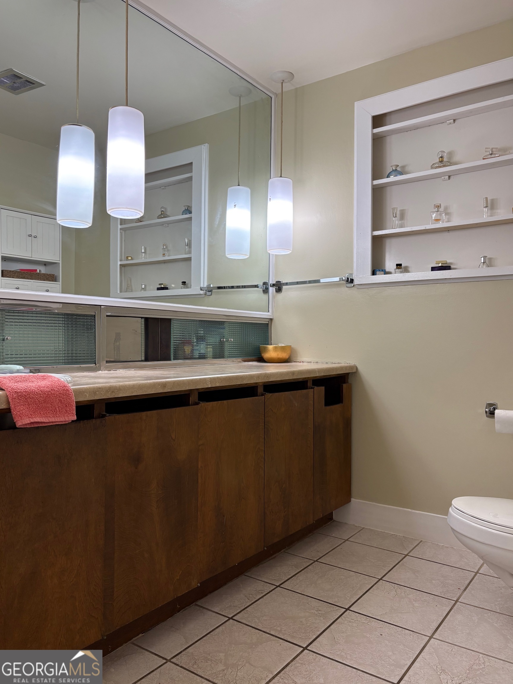 700 Forrest Drive Fort Valley, GA 31030 - Photo 33 of 41 a kitchen with a cabinets and chandelier