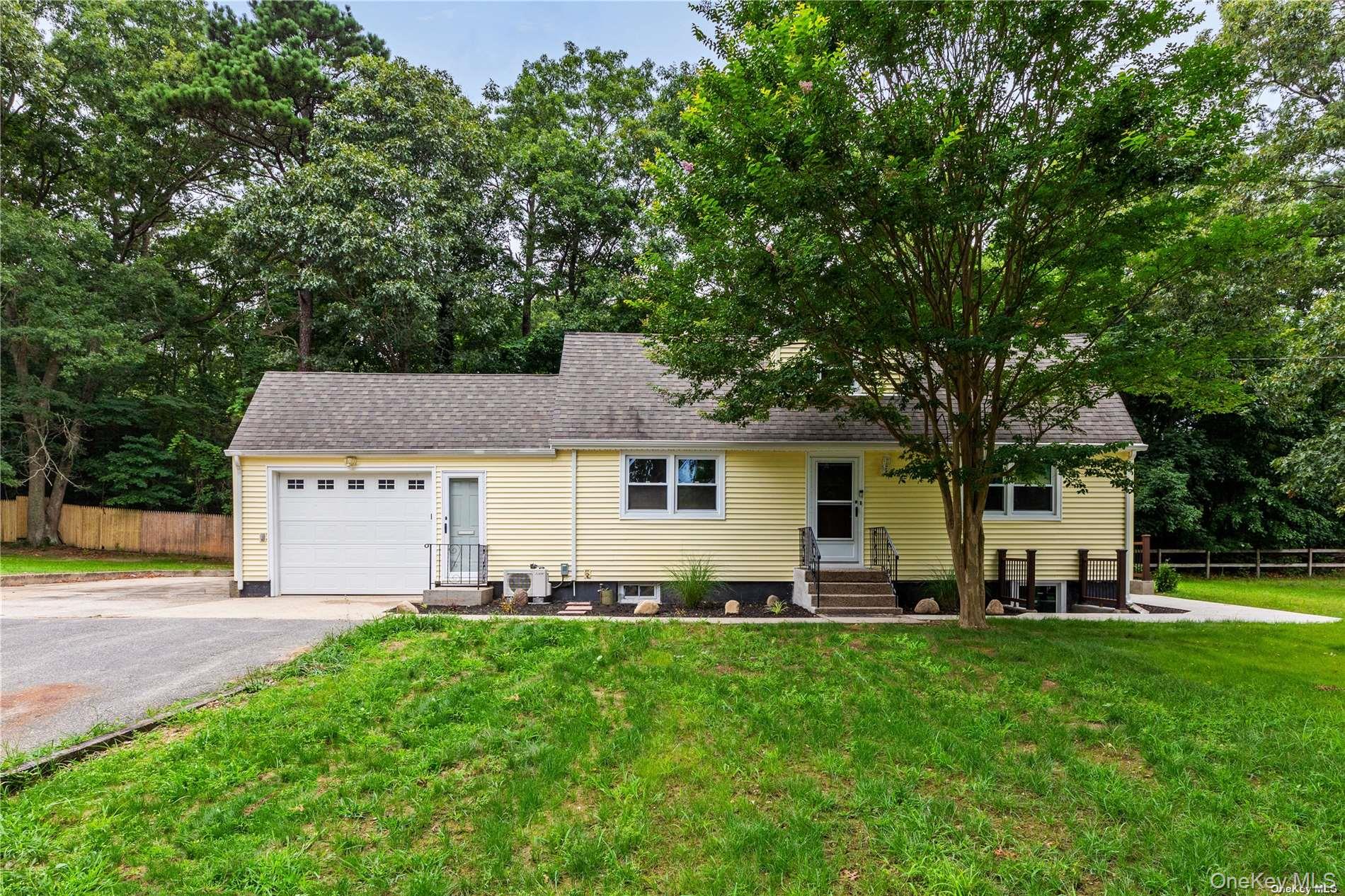 110 East Bartlett Road Middle Island, NY 11953 - Photo 1 of 29 a view of a house with backyard