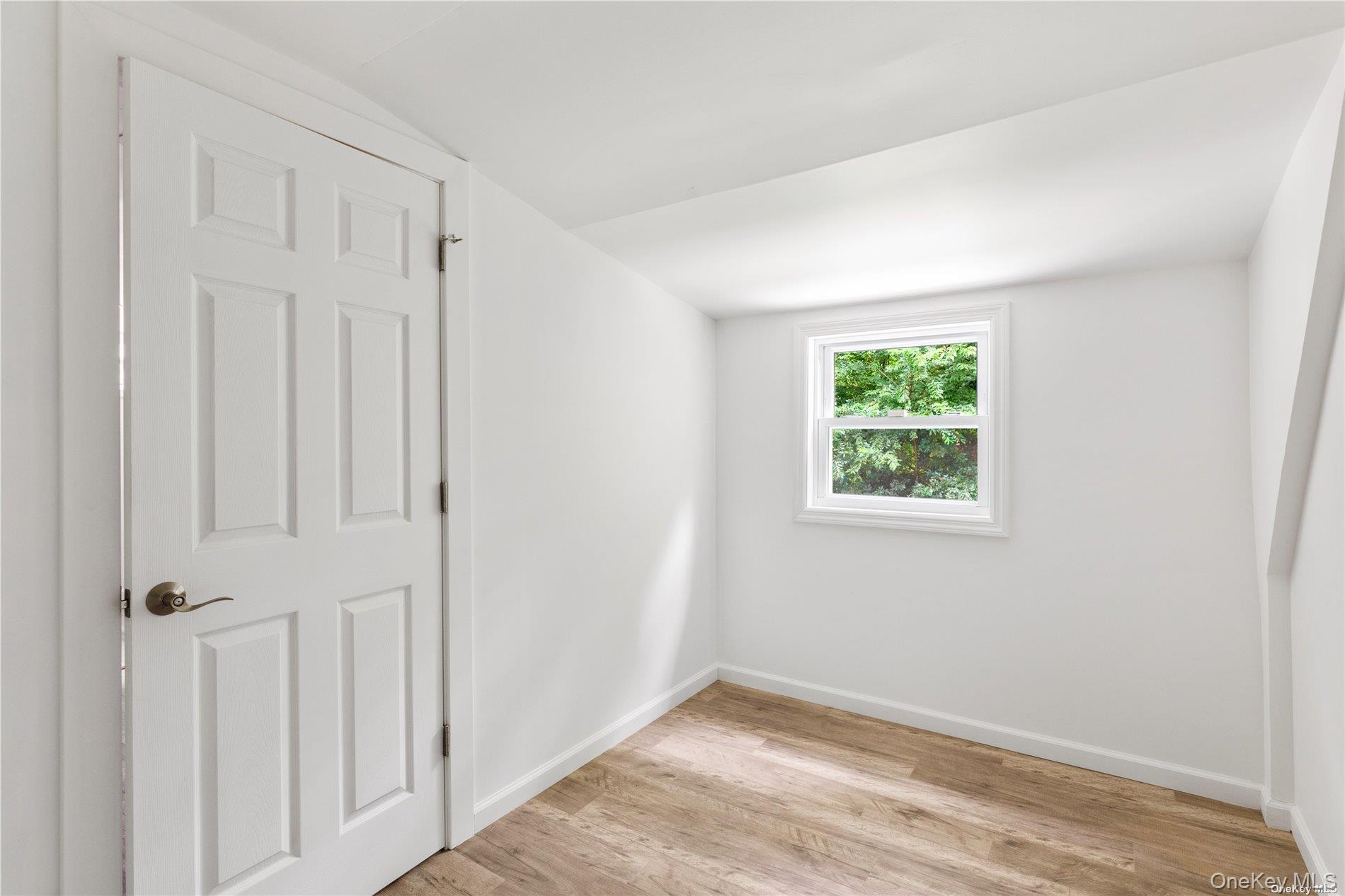 110 East Bartlett Road Middle Island, NY 11953 - Photo 22 of 29 an empty room with windows