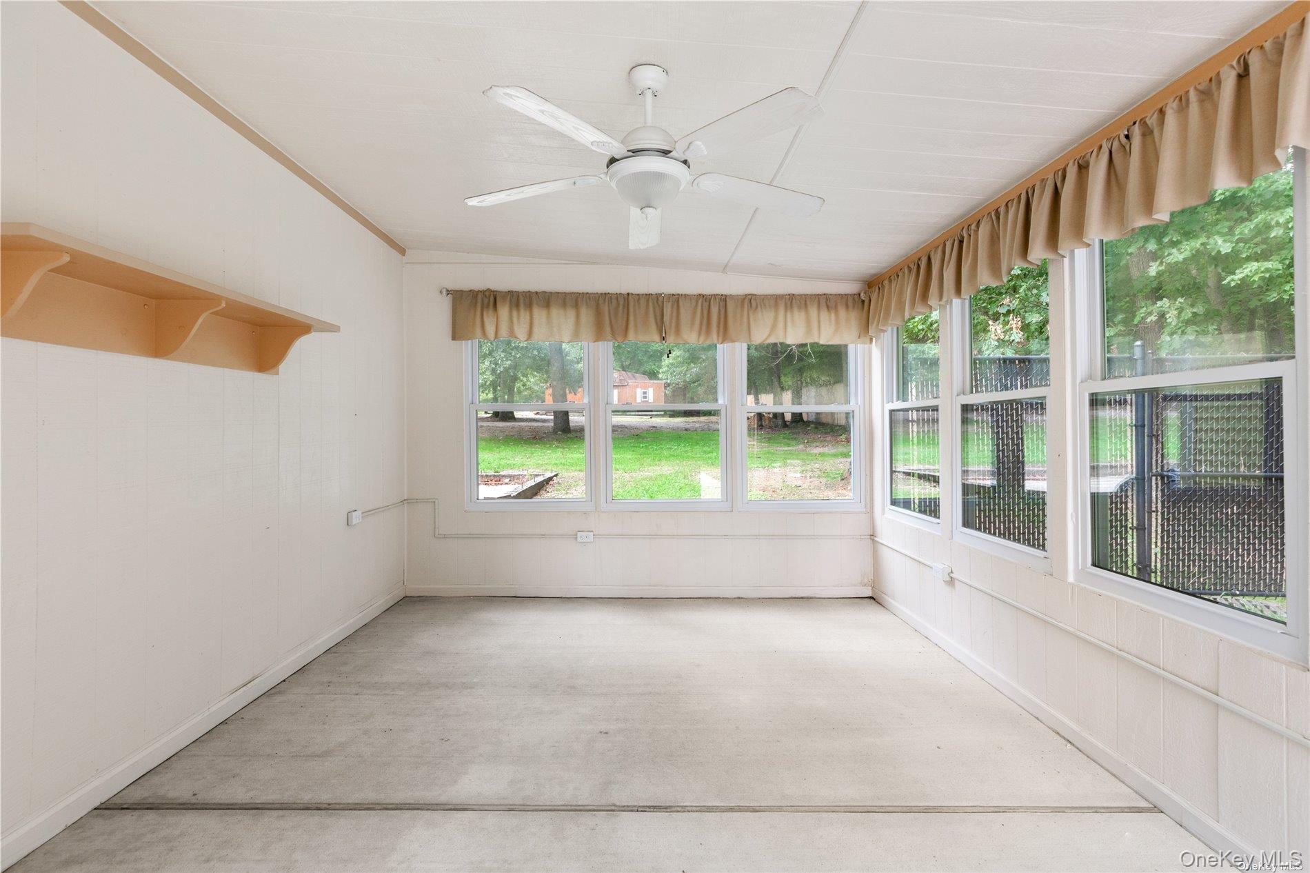 110 East Bartlett Road Middle Island, NY 11953 - Photo 23 of 29 a view of room with window and ceiling fan