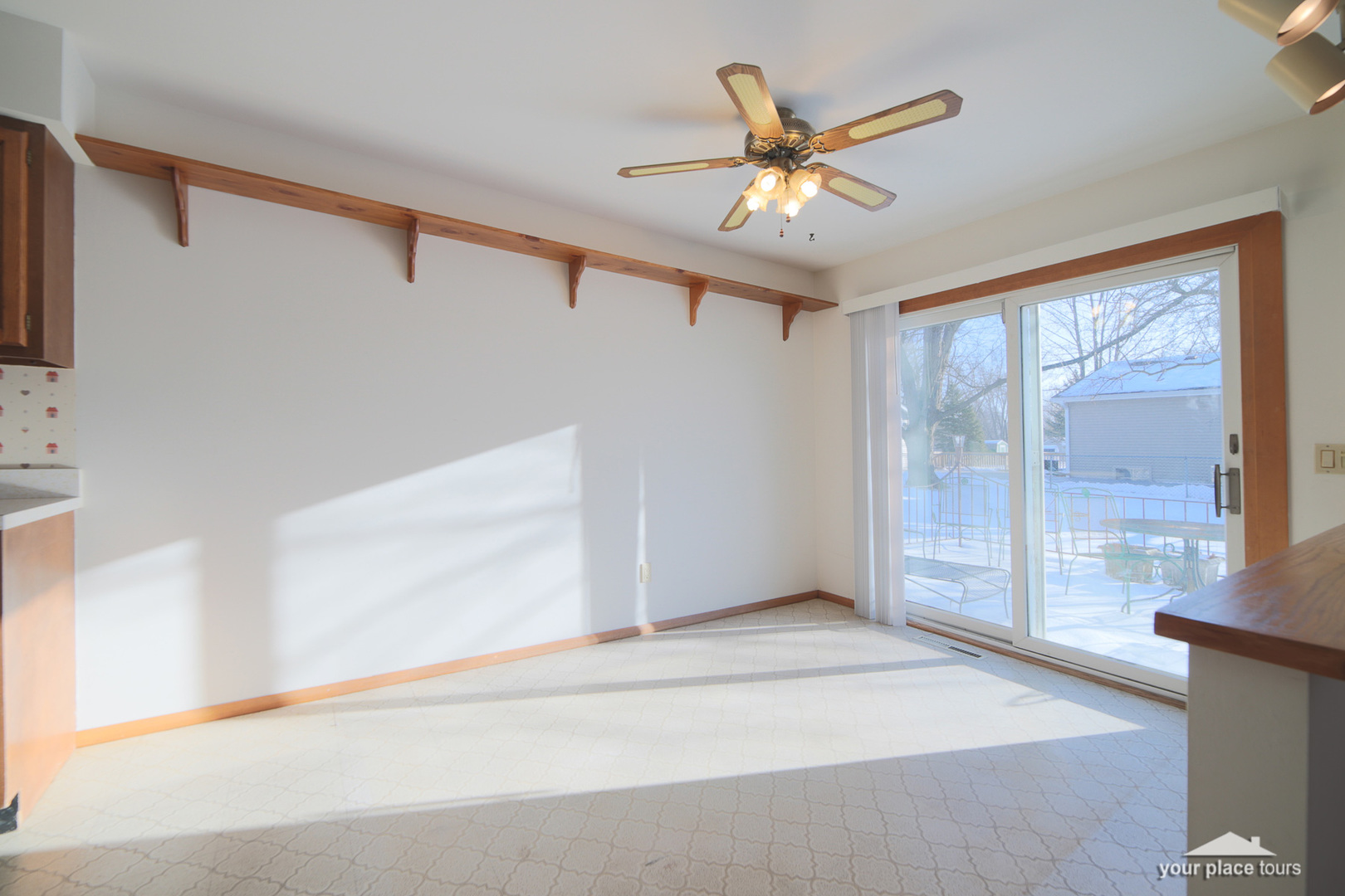54 Pembrooke Road Montgomery, IL 60538 - Photo 14 of 31 a view of a livingroom with a ceiling fan and window