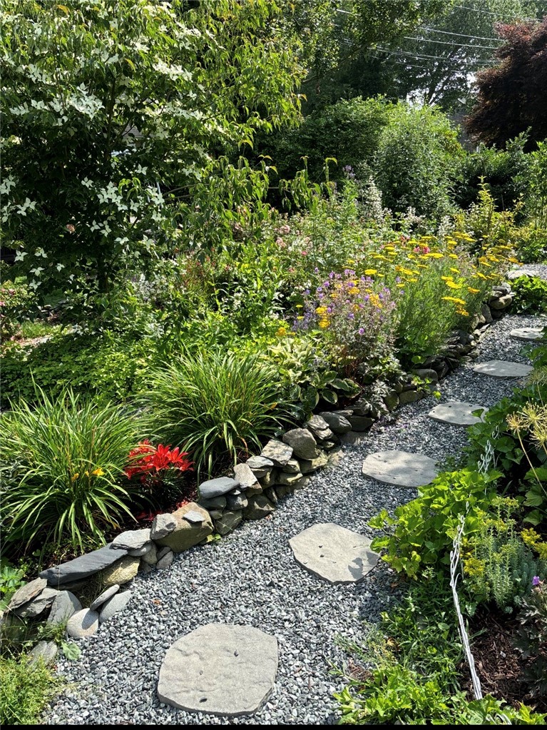 80 Spindrift Street Jamestown, RI 02835 - Photo 35 of 46 Summer gardens side yard