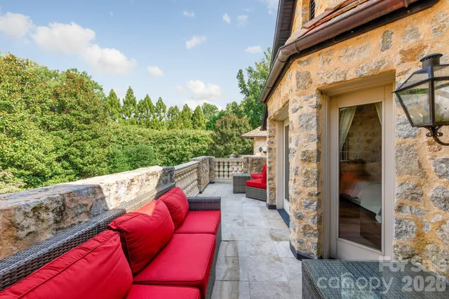 a outdoor living space with furniture and a garden