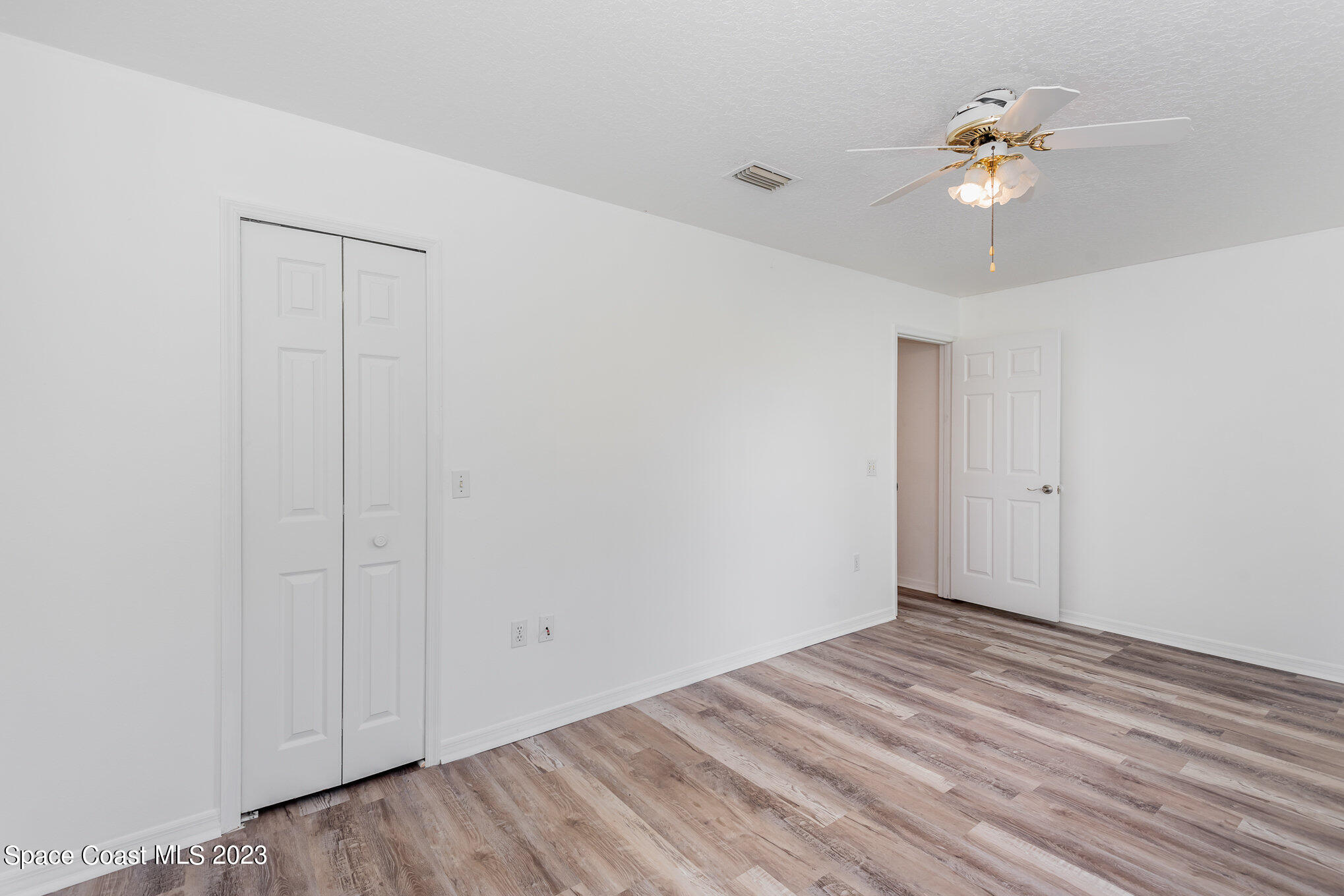 4390 London Town Road Titusville, FL 32796 - Photo 15 of 25 a view of a room with a ceiling fan