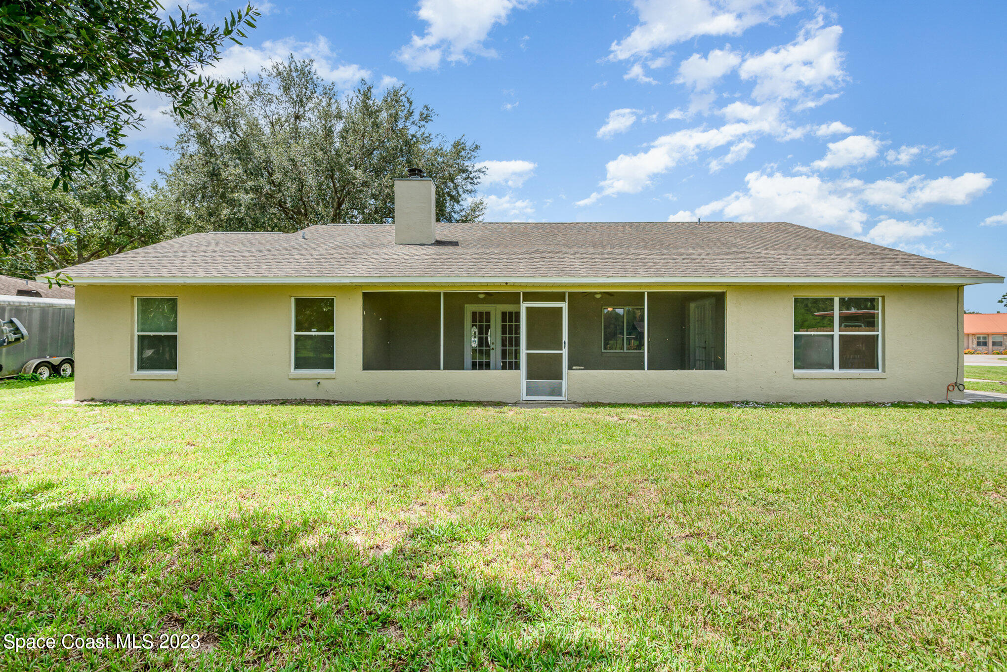 4390 London Town Road Titusville, FL 32796 - Photo 24 of 25 a front view of a house with a garden