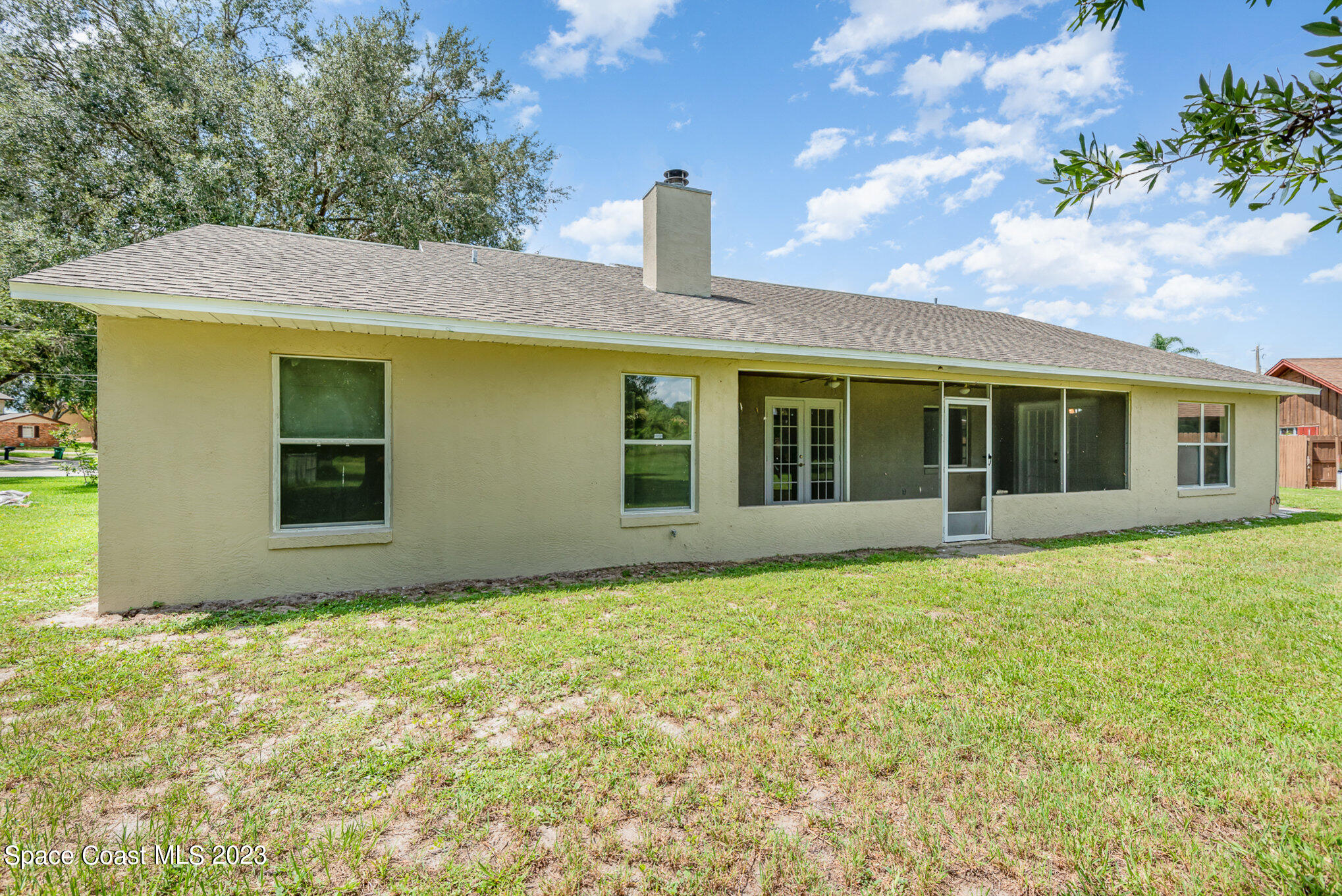 4390 London Town Road Titusville, FL 32796 - Photo 25 of 25 a house view with a garden space