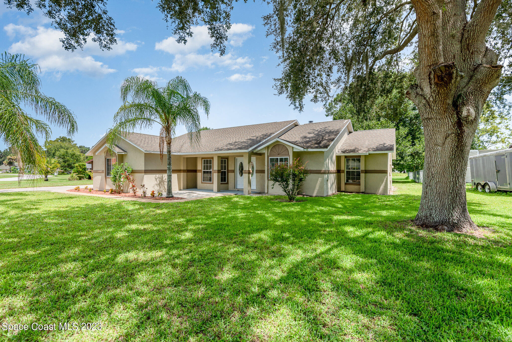 4390 London Town Road Titusville, FL 32796 - Photo 3 of 25 a view of a house with a yard