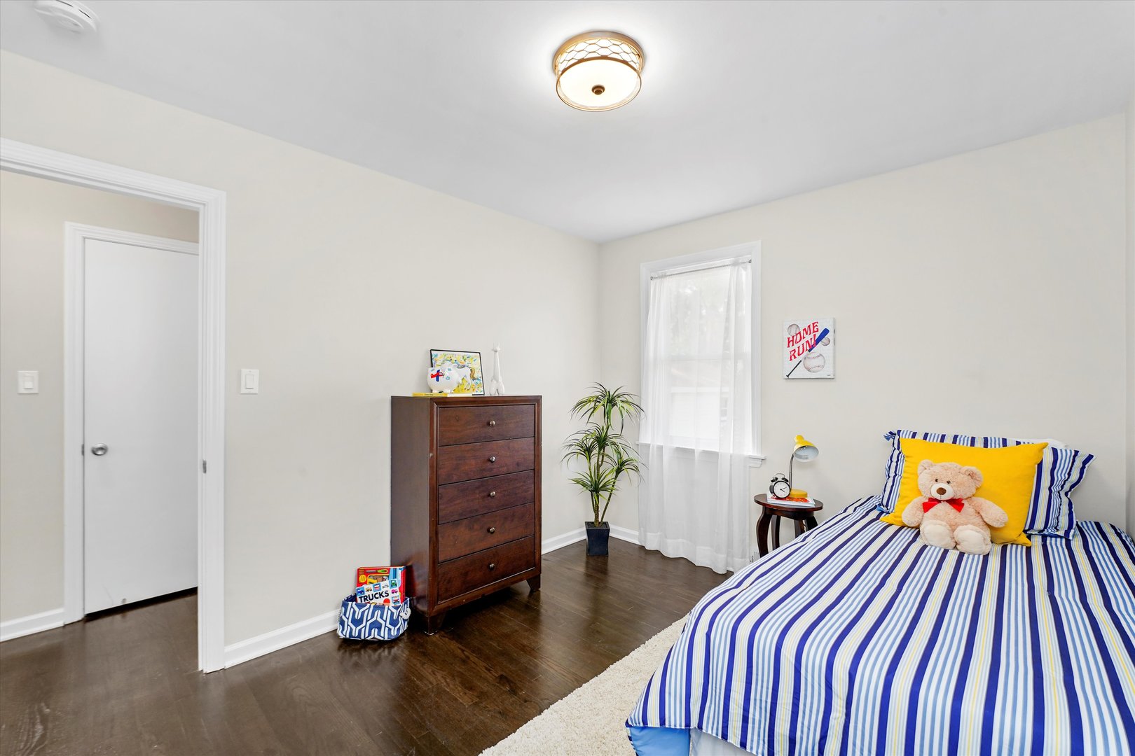 4718 Butterfield Road Hillside, IL 60162 - Photo 15 of 17 a view of a workspace with furniture and wooden floor