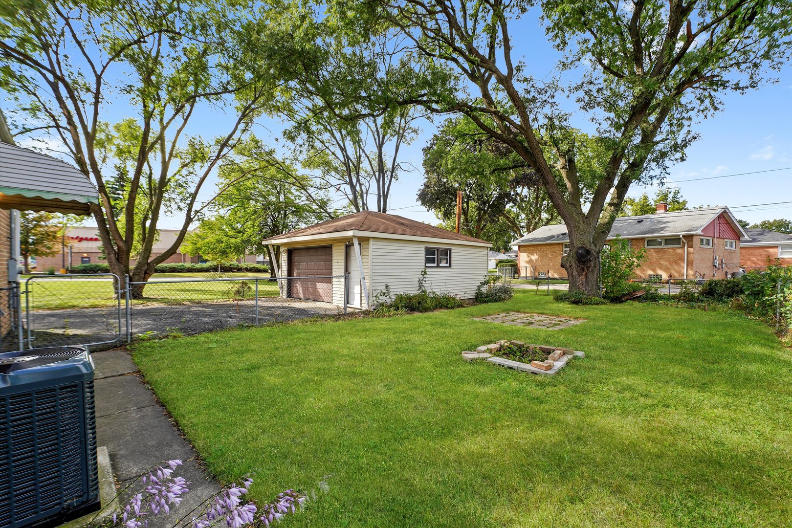 4718 Butterfield Road Hillside, IL 60162 - Photo 3 of 17 a front view of a house with a yard