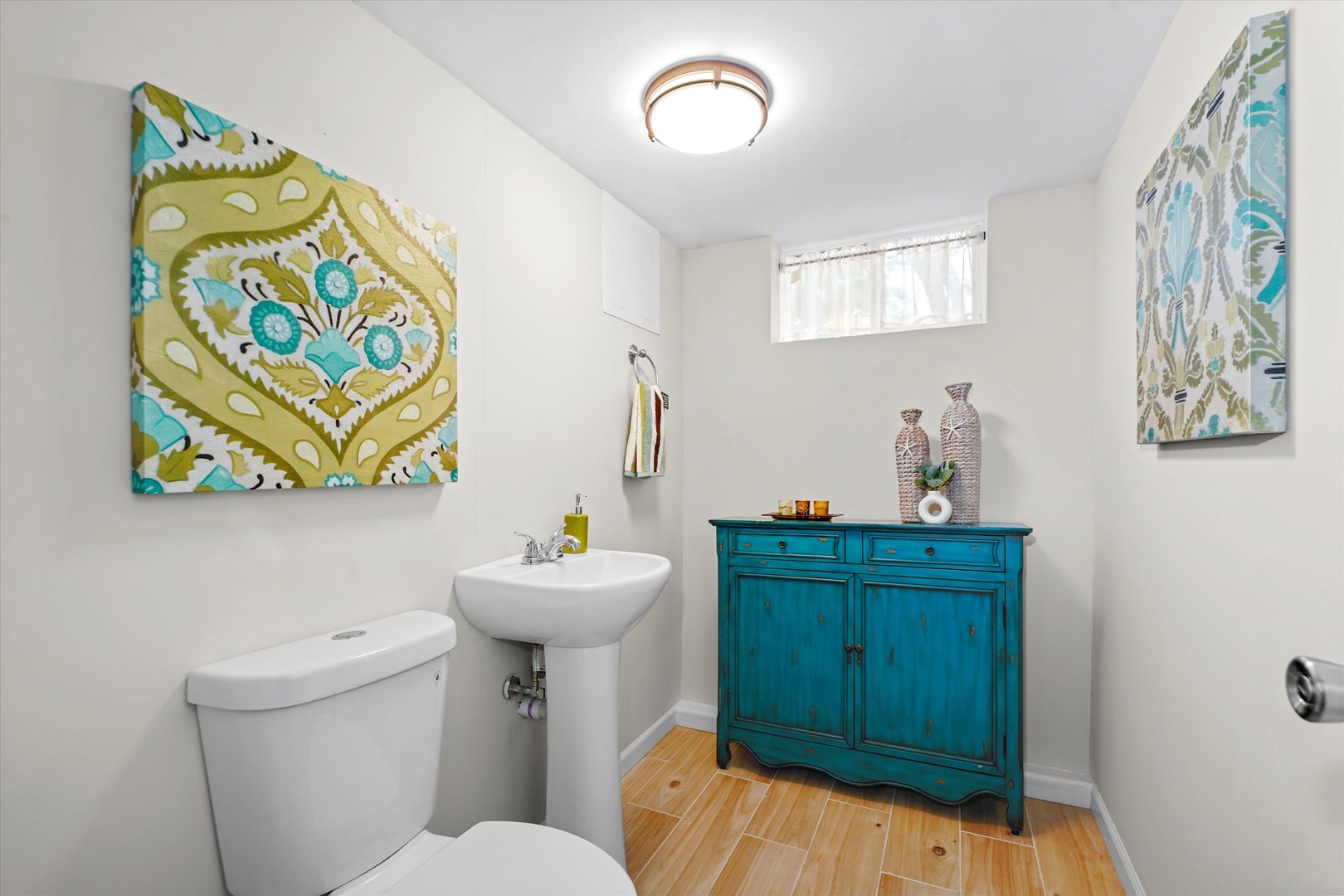 4718 Butterfield Road Hillside, IL 60162 - Photo 10 of 17 a bathroom with a sink mirror vanity and toilet