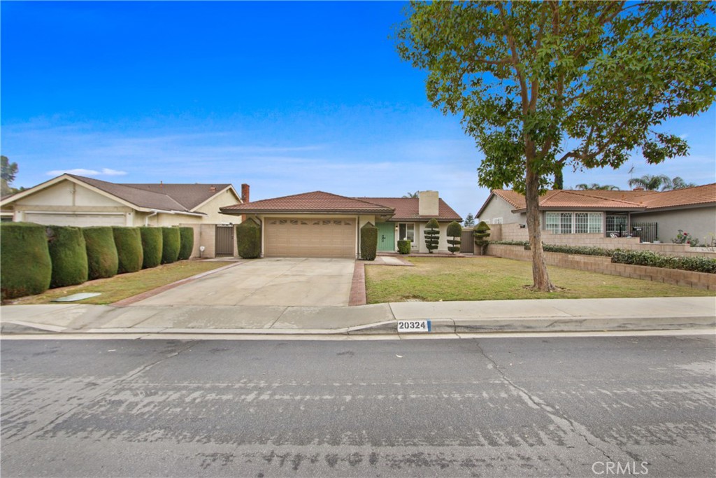20324 East Vejar Road Walnut, CA 91789 - Photo 1 of 1 a house with yard in front of it