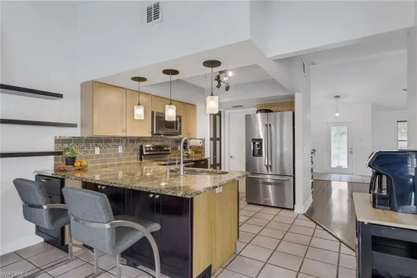 $599,900 | 2667 River Reach Drive, Naples, FL 34104
