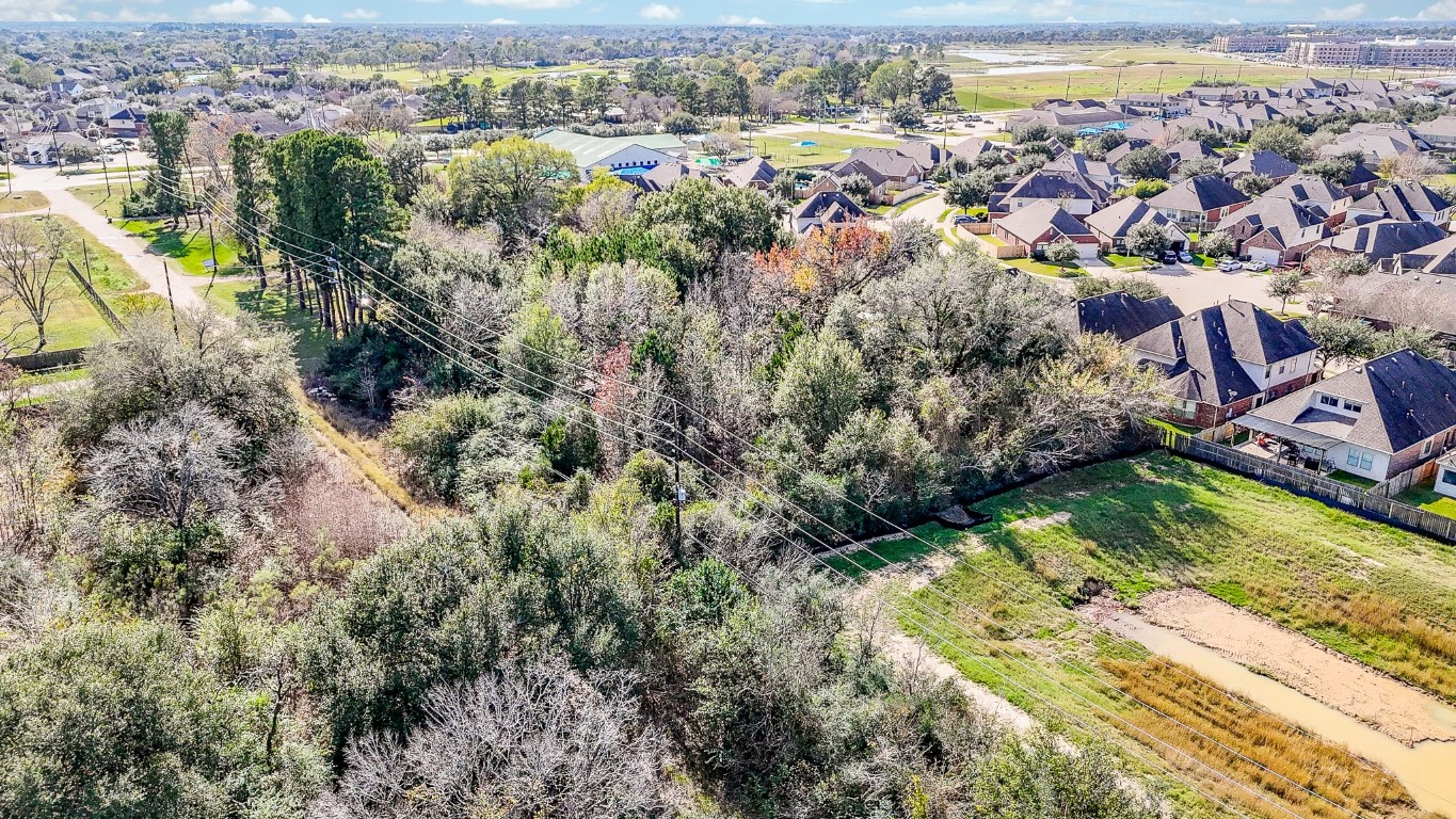 1021-1033 Roesner Road Katy, TX 77494 - Photo 11 of 29 an aerial view of residential houses with outdoor space