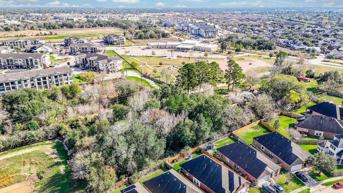 1021-1033 Roesner Road Katy, TX 77494 - Photo 13 of 29 an aerial view of residential houses with outdoor space