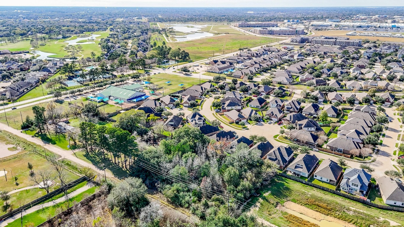 1021-1033 Roesner Road Katy, TX 77494 - Photo 16 of 29 an aerial view of residential building and lake
