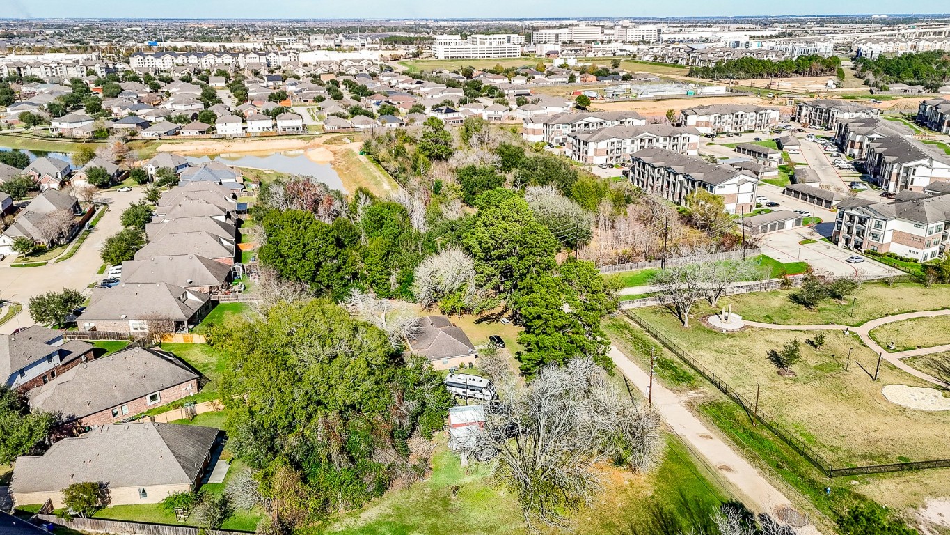 1021-1033 Roesner Road Katy, TX 77494 - Photo 24 of 29 an aerial view of residential houses with outdoor space