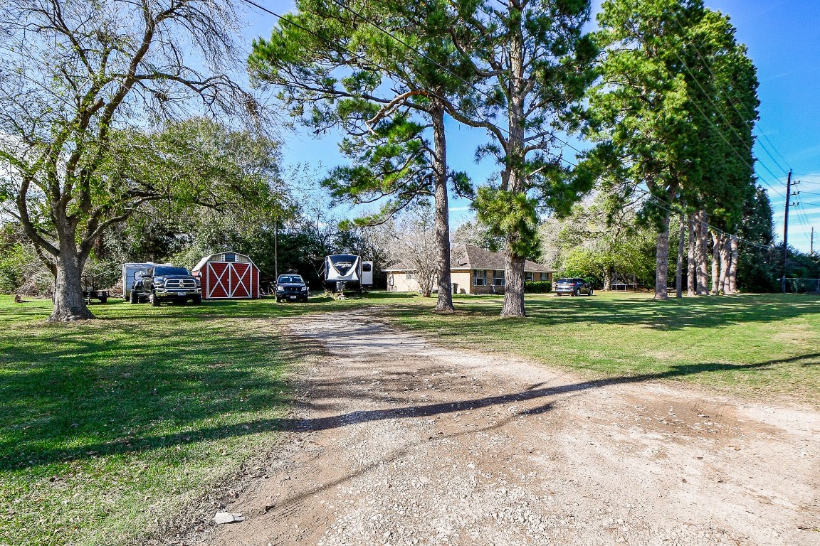 1021-1033 Roesner Road Katy, TX 77494 - Photo 4 of 29 a view of a park with large trees