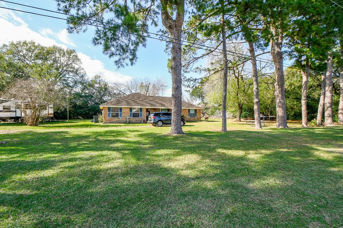 1021-1033 Roesner Road Katy, TX 77494 - Photo 6 of 29 a view of a house with a big yard