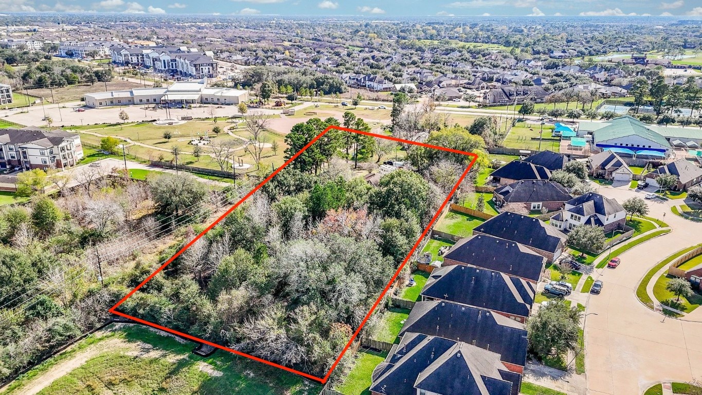 1021-1033 Roesner Road Katy, TX 77494 - Photo 10 of 29 an aerial view of residential houses with outdoor space