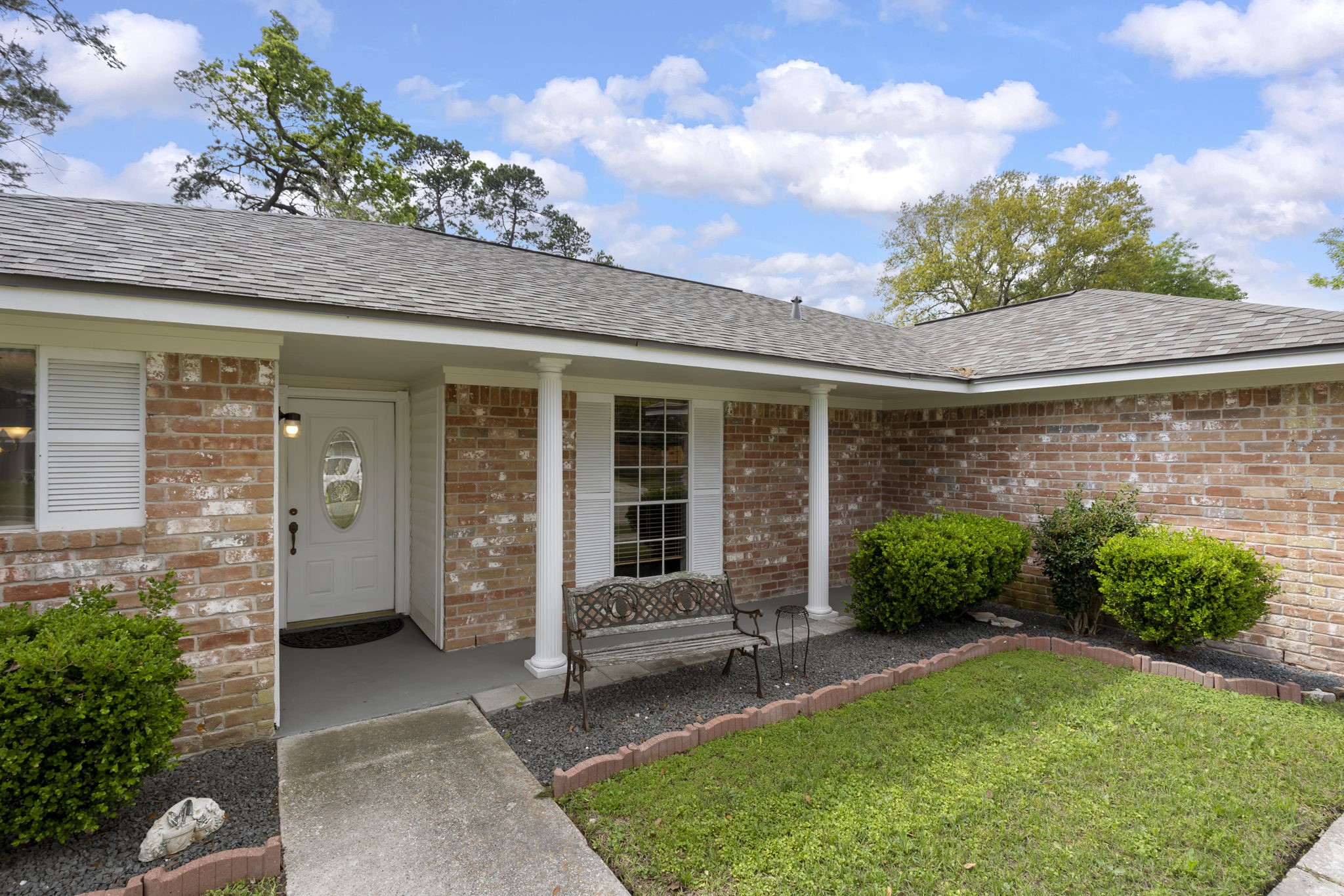 Charming curb appeal meets PEACE-OF-MIND UPDATES! This beautifully maintained 3-bedroom, 2-bath home features MAJOR SYSTEM IMPROVEMENTS including ROOF, 14 SEER A/C, gas furnace, ductwork, gas WATER HEATER, full PEX-A plumbing, and updated electrical panel. Welcoming covered front porch, classic lamppost, and decorative brick-accented flower beds create an inviting first impression!