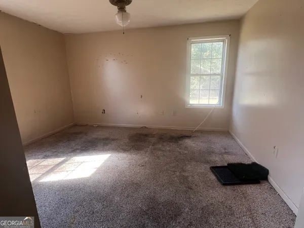 an empty room with a window