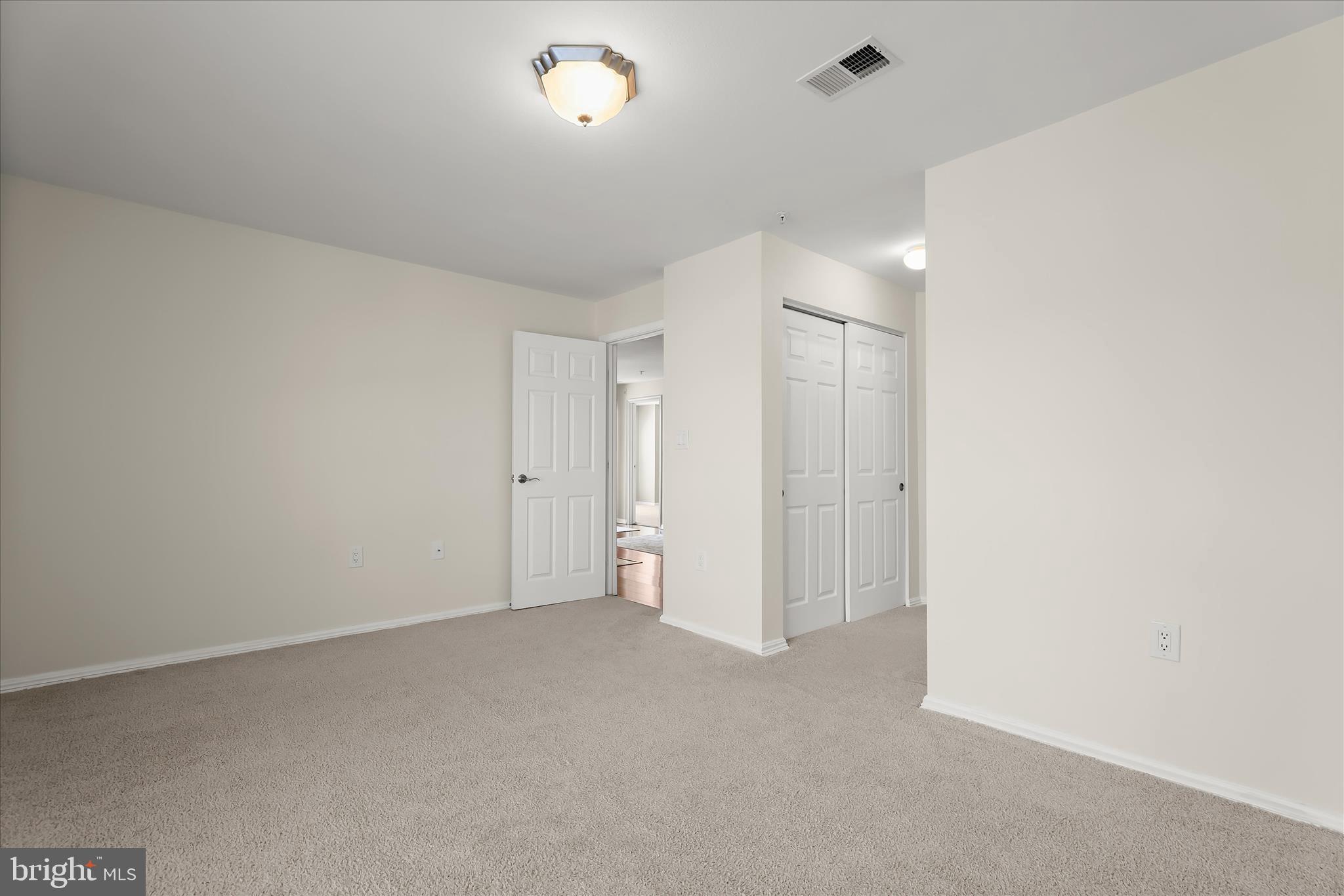 3555 Floating Leaf Lane, Unit C201 Laurel, MD 20724 - Photo 21 of 37 a view of an empty room