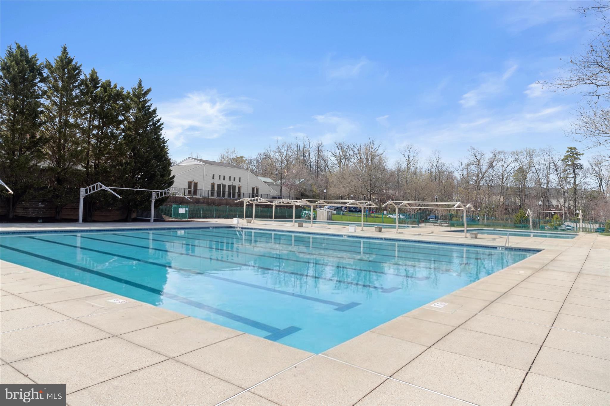 3555 Floating Leaf Lane, Unit C201 Laurel, MD 20724 - Photo 32 of 37 a view of swimming pool with a back yard