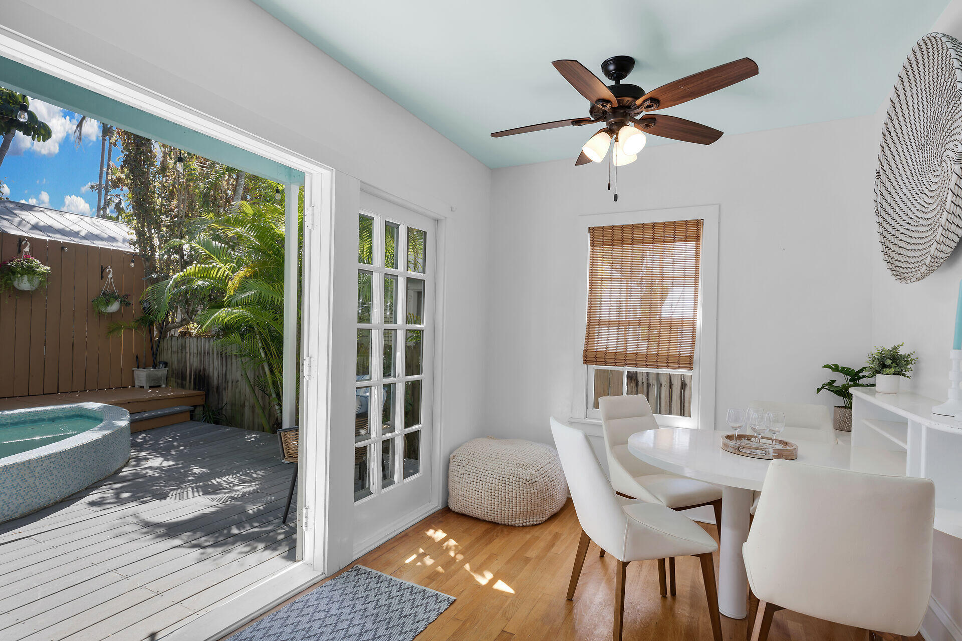 1022 Fleming Street Key West, FL 33040 - Photo 14 of 58 a workspace with wooden floor and windows
