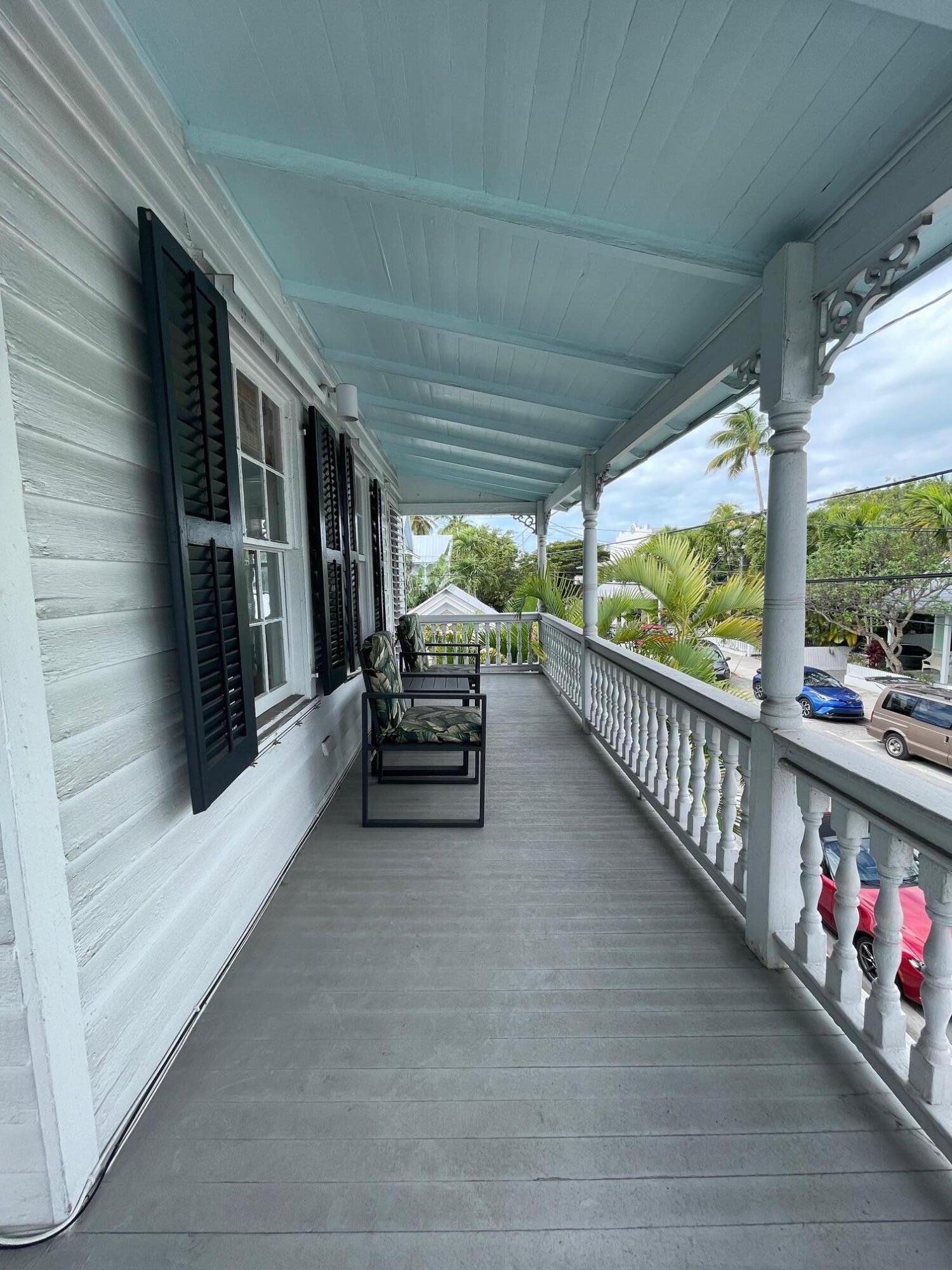 1022 Fleming Street Key West, FL 33040 - Photo 51 of 58 a view of two chairs in the balcony