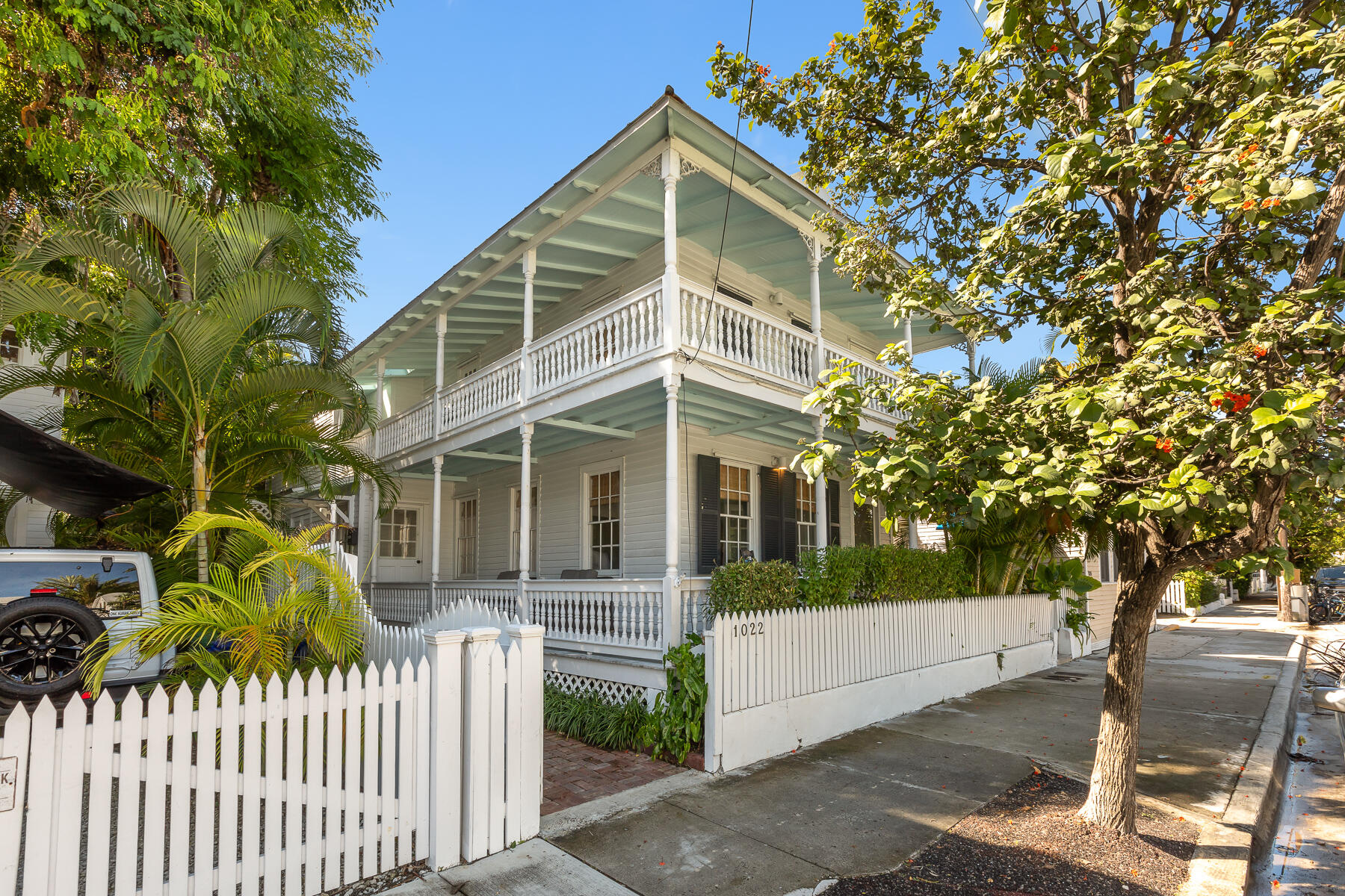 1022 Fleming Street Key West, FL 33040 - Photo 54 of 58 a front view of a house with a tree