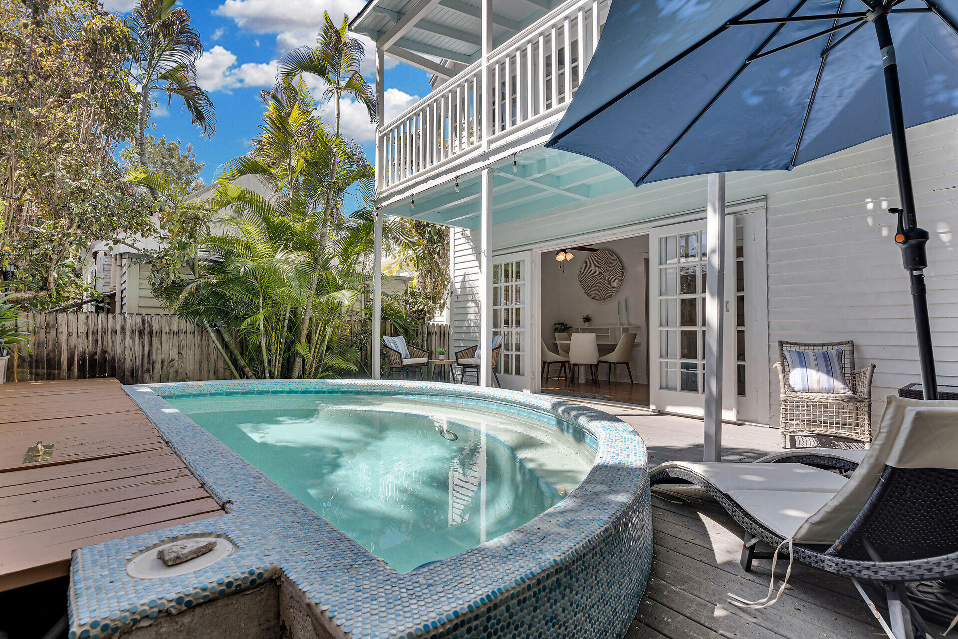 1022 Fleming Street Key West, FL 33040 - Photo 7 of 58 a view of a swimming pool with sitting area