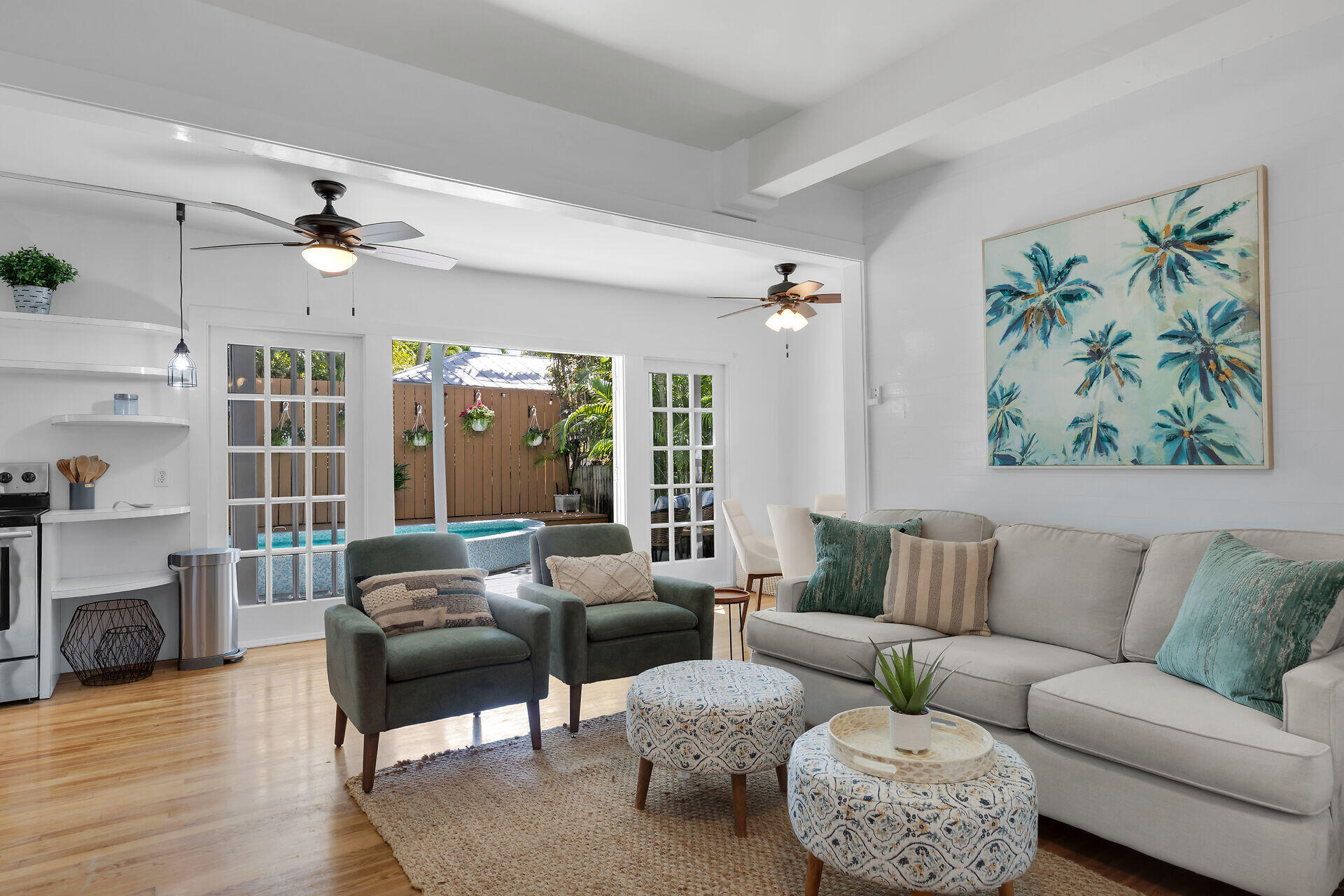 1022 Fleming Street Key West, FL 33040 - Photo 9 of 58 a living room with furniture ceiling fan and a rug