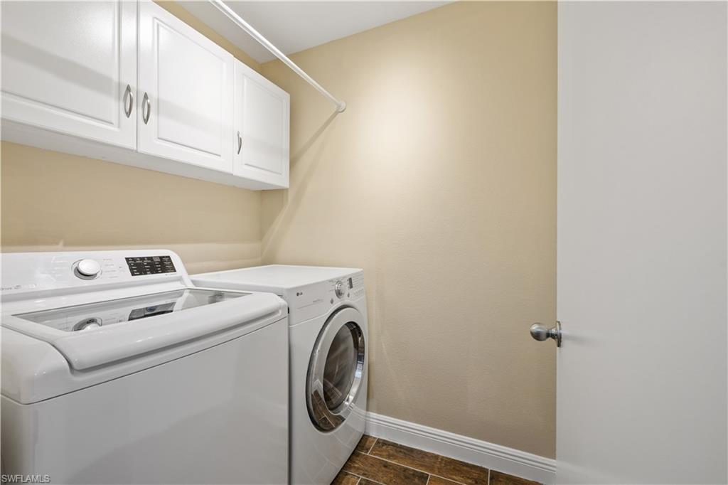 2142 Arbour Walk Circle, Unit 2626 Naples, FL 34109 - Photo 15 of 20 a utility room with dryer and washer