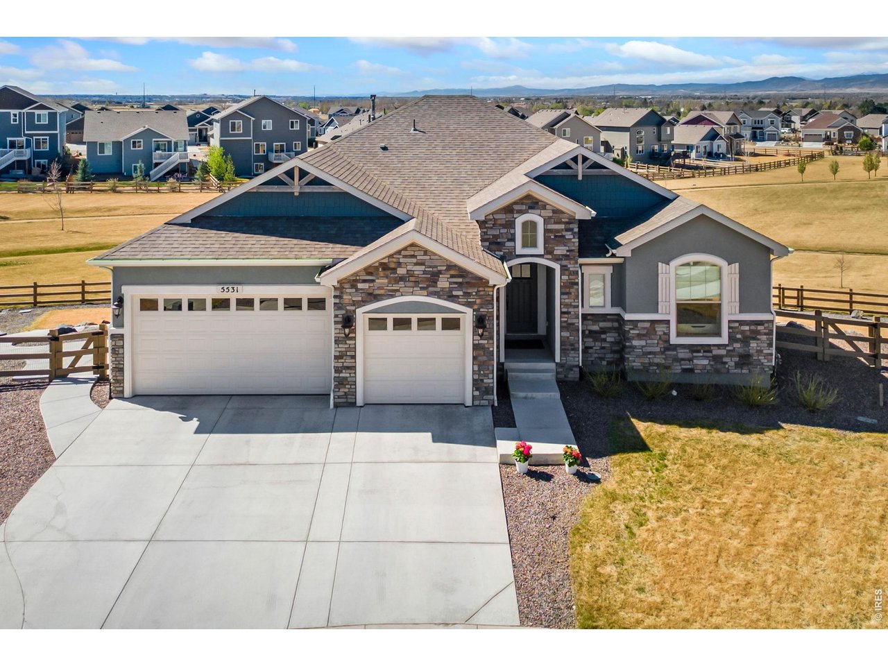 5531 Teeling Court Timnath, CO 80547 - Photo 1 of 48 a view of a building with a ocean view