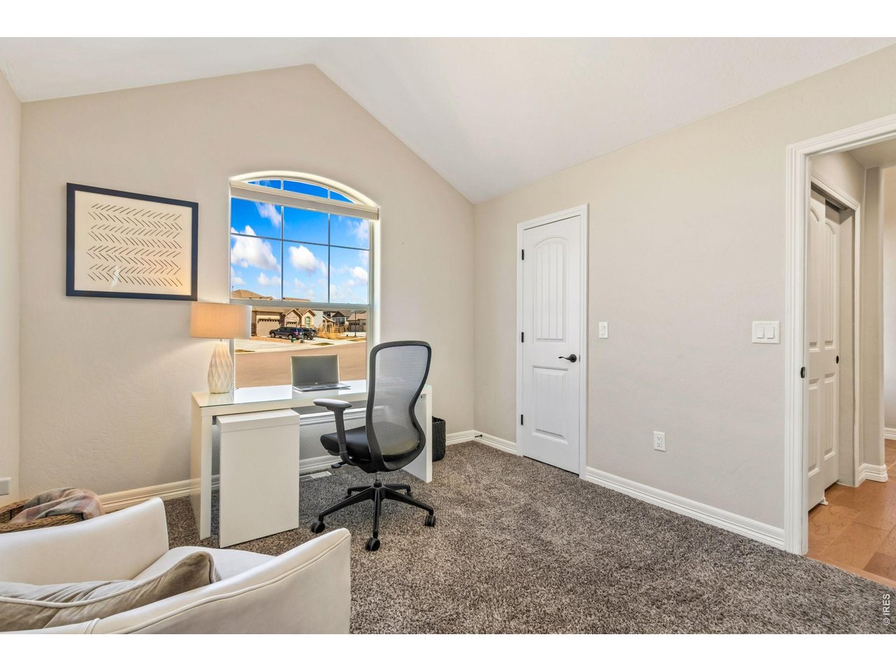 5531 Teeling Court Timnath, CO 80547 - Photo 17 of 48 a work room with a couch and a window