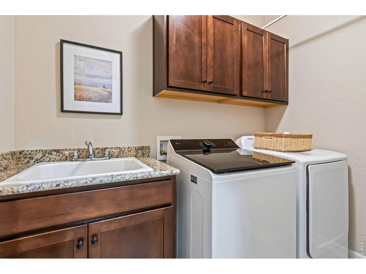 5531 Teeling Court Timnath, CO 80547 - Photo 26 of 48 a utility room with stainless steel appliances granite countertop a sink and a cabinets