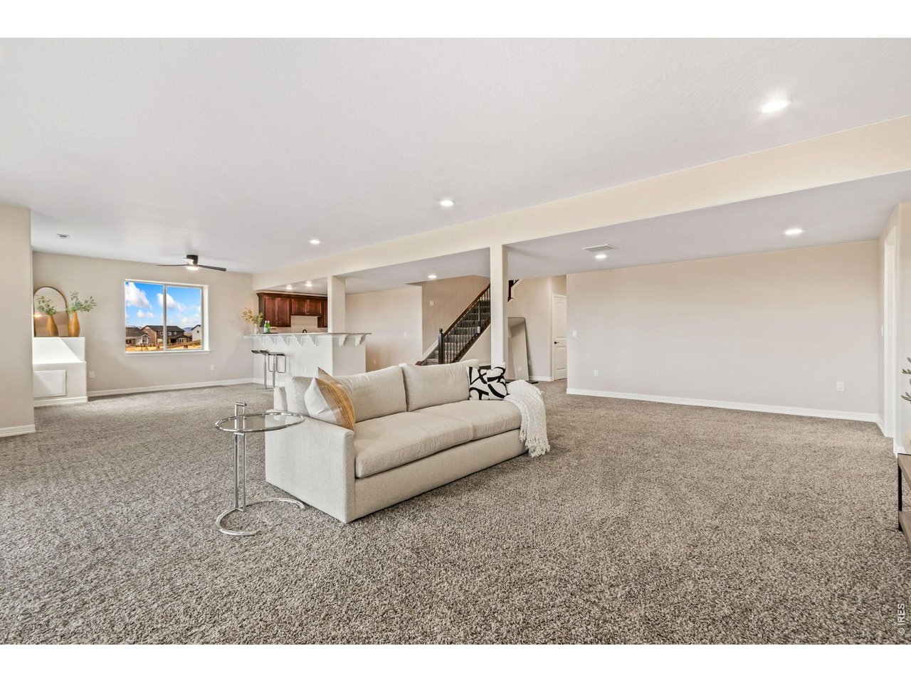 5531 Teeling Court Timnath, CO 80547 - Photo 29 of 48 a living room with furniture and a wooden floor
