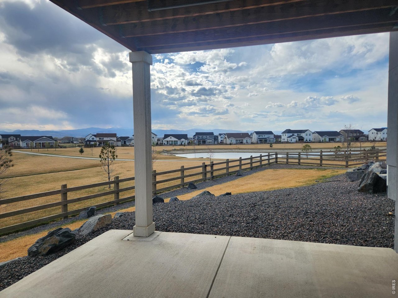 5531 Teeling Court Timnath, CO 80547 - Photo 32 of 48 a view of swimming pool with a table and chairs in the patio